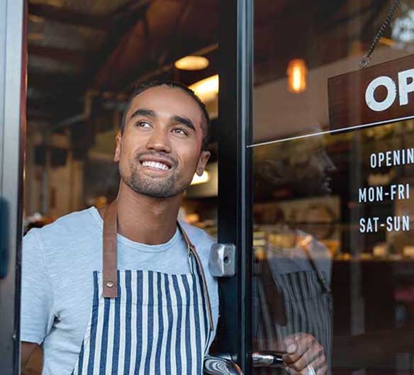 man in cafe door