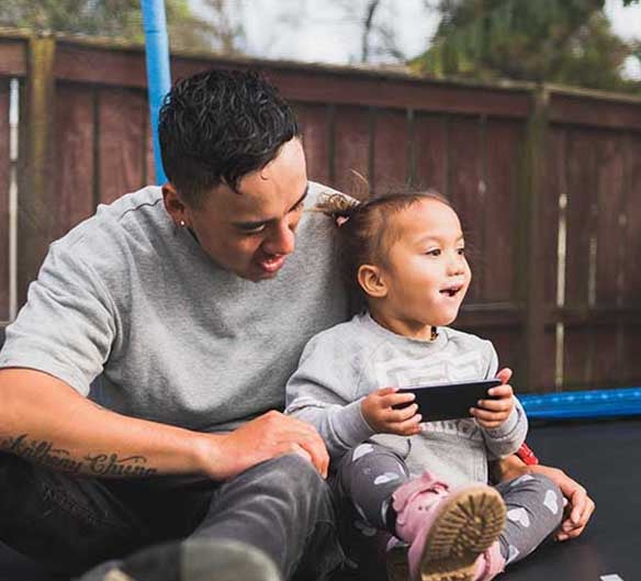 man and daughter on tramp