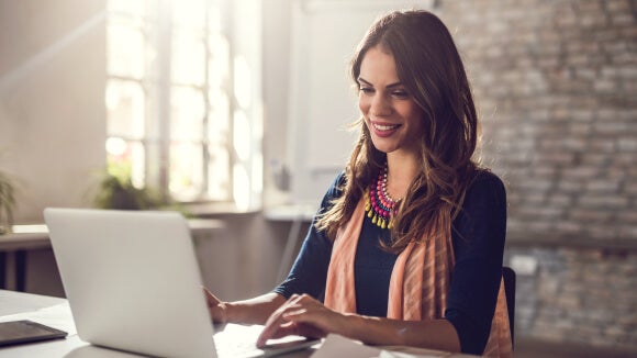 employee working remotely on laptop employee working remotely on laptop