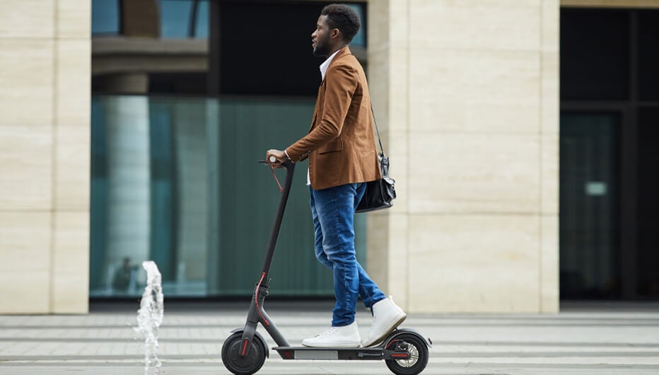 man on scooter