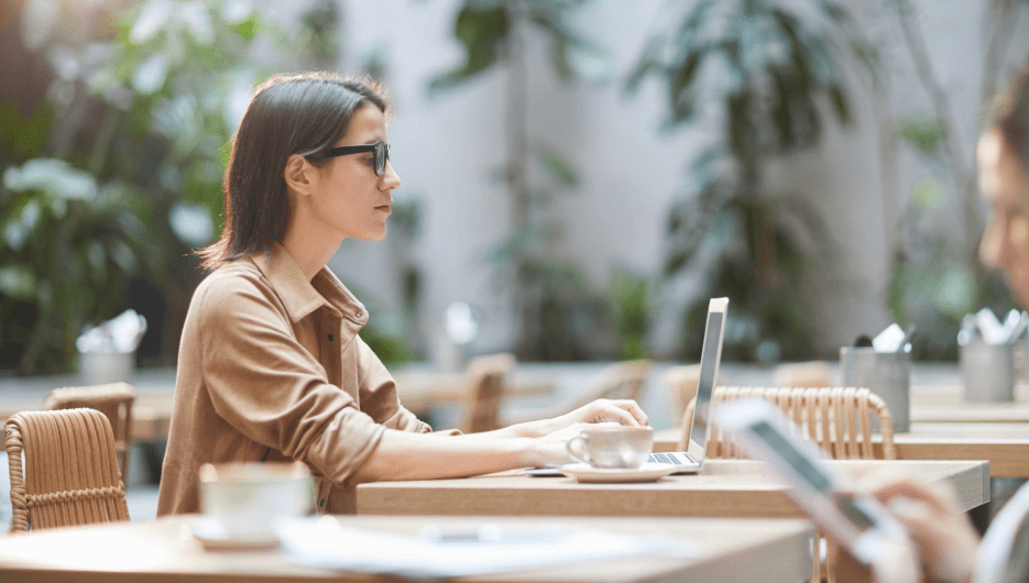 woman in her laptop applying for jobs using AI