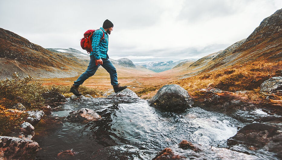 man hiking in countryside