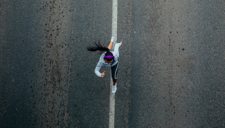 woman running ariel view
