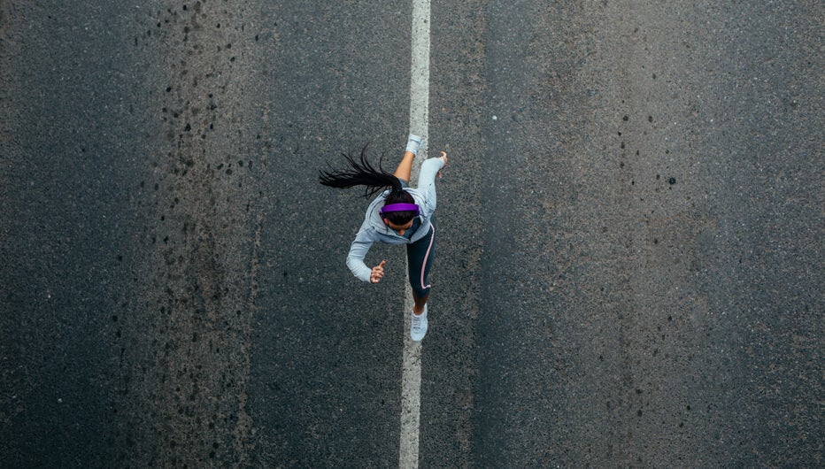woman running arial view