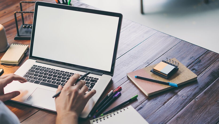 person working in a laptop
